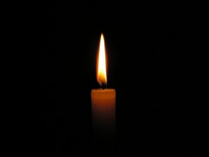 A candle in the darkness